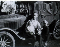 Fred Lowe, cousin in law with Heather on knee and Coral