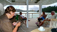Maggie knitting while waiting for the tender