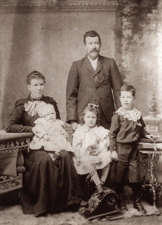 Grandpa and Grandma Gorman. Uncle Jim, Mum and baby Ruby.